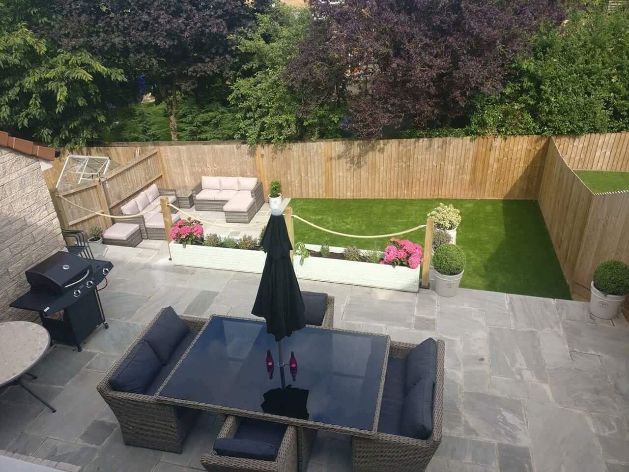 landscaped garden with new lawn and patio