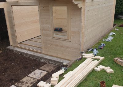 Expert Log Cabin Installation with Concrete Base