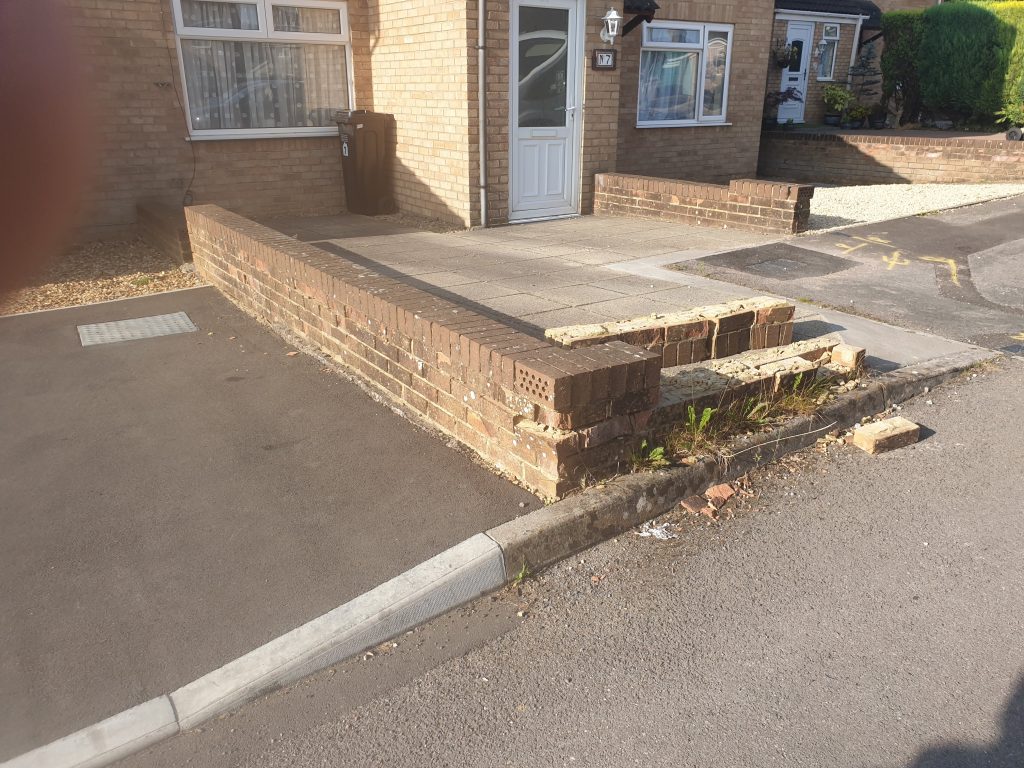 Tidy and low maintenance Westfield driveway with drainage channels and soakaway.