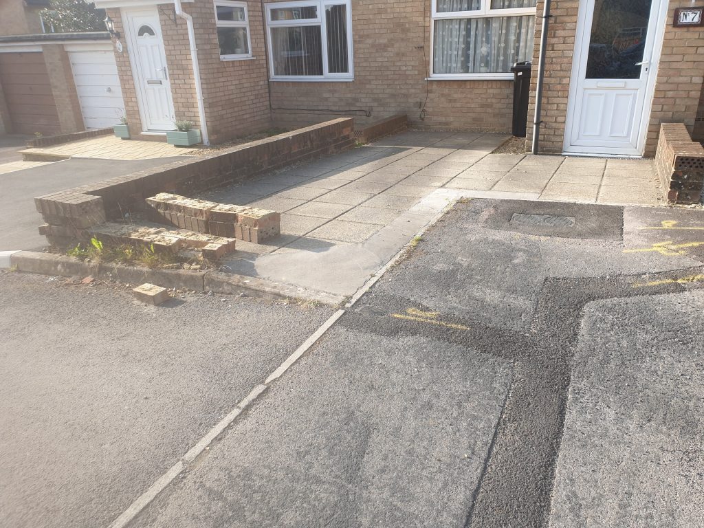 Tidy and low maintenance Westfield driveway with drainage channels and soakaway.