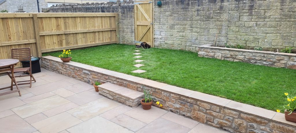 Garden renovation in Paulton with Raj sandstone patio and rough stone walling