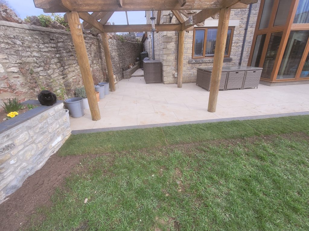 Patio and raised stone flowerbed in chilcompton
