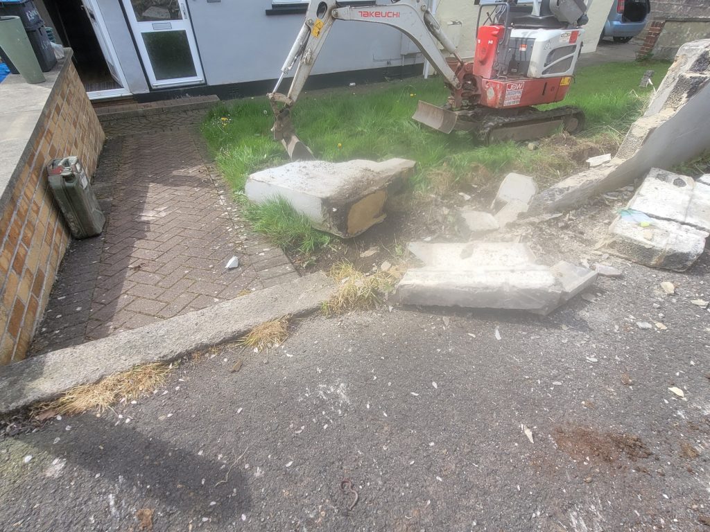 Tarmac driveway and drop kerb installation in Holcombe - Meticulously excavated and leveled with edging, providing a seamless transition from pavement to driveway for improved accessibility.