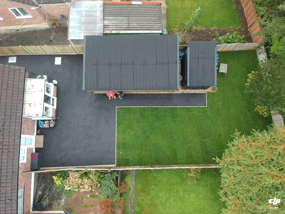 Shepton Mallet driveway overhaul with new tarmac and turfing.